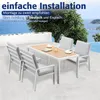 A patio dining set with chairs and a table on a balcony overlooking the ocean. Produktbild-Vorschau