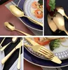 A collage of images showing gold-colored cutlery, including spoons, forks, and knives, arranged on plates with food and strawberries. Anteprima dell’immagine prodotto