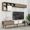 A modern TV unit with shelves and cabinets, featuring a television and decorative items. Náhled obrázku produktu