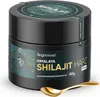 A black jar of Himalayan Shilajit Harz with a gold spoon in front of it, set against a white background. Náhled obrázku produktu