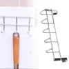 A split image showing a kitchen utensil hanging on a rack on the left, and a separate stainless steel door hook rack on the right. Produktbild-Vorschau