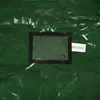 A close-up view of a green storage bag with a clear window and a brand label. Produktbild-Vorschau