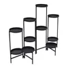A black metal plant stand with multiple tiers. Podgląd zdjęcia produktu