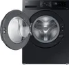 A black Samsung washing machine with the door open, showing the drum inside. The control panel is visible at the top. Produktbild-Vorschau
