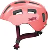 A pink bicycle helmet for children, with straps and buckles. Produktbild-Vorschau