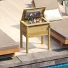 A wooden cooler filled with drinks sits on a deck next to a swimming pool and lounge chairs. Podgląd zdjęcia produktu
