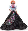 A Barbie doll dressed in a black gown with colorful embroidery, standing against a white background. Náhled obrázku produktu