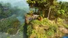 A lush, green jungle scene with a rocky outcrop and palm trees, overlooking a misty river or valley. Produktbild-Vorschau