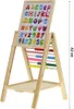 A wooden easel with a whiteboard displaying alphabet letters and numbers, and an abacus with colorful beads. Voir les images du produit