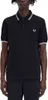A man wearing a black Fred Perry polo shirt. Produktbild-Vorschau