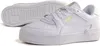 A pair of white Puma sneakers with gold accents, shown from a slightly elevated side angle. One shoe is fully visible, while the sole of the other shoe is visible behind it. Produktbild-Vorschau
