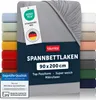 A folded gray fitted sheet with various color swatches on the left and right sides. Produktbild-Vorschau