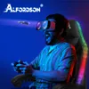 A man wearing a VR headset and playing a video game while sitting in a gaming chair with LED lights. Podgląd zdjęcia produktu
