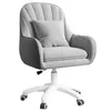 A gray velvet office chair with a pillow on a white background. Produktbild-Vorschau