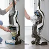 Two images showing a person using a Bissell CrossWave cordless vacuum cleaner. Produktbild-Vorschau
