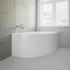 A modern bathroom with a white corner bathtub against a textured gray tiled wall and a large window overlooking a city. Produktbild-Vorschau