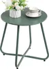 A green metal side table with a vase of flowers and a cup of tea on top. Produktbild-Vorschau