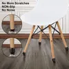 A white chair with wooden legs is shown, with close-ups of the chair legs before and after applying black protective caps. Produktbild-Vorschau