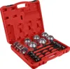 A red plastic case containing a set of silver metal tools, likely for automotive repair. Náhled obrázku produktu