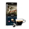 A box of Martello Ristretto Espresso coffee capsules next to a cup of prepared espresso. Produktbild-Vorschau