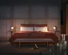 A bedroom scene with a bed, lamps, and a rug. Náhled obrázku produktu