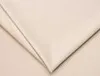 A close-up view of a folded beige fabric, likely a sofa cushion or upholstery. Produktbild-Vorschau