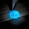 A close-up of a blue, glowing, stylized gear or wheel-like object in front of a dark wooden surface, possibly indicating a feature of a dishwasher. Anteprima dell’immagine prodotto