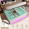 A bed with its storage compartment open, showcasing organized storage solutions and LED lighting. Podgląd zdjęcia produktu