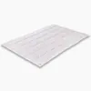 A white comforter laid out flat on a white background. Produktbild-Vorschau