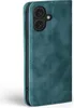 A close-up, side view of a teal-colored flip phone case with a camera cutout. Produktbild-Vorschau