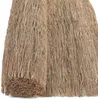 A close-up, full-frame shot of a roll of natural reed fencing. Náhled obrázku produktu
