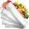 A stack of vacuum seal rolls in front of a collage of food items. Anteprima dell’immagine prodotto