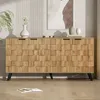 A wooden sideboard with a textured front is displayed in a room setting with a painting on the wall and a plant. Anteprima dell’immagine prodotto