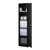 A tall, black metal cabinet with its door slightly open, displaying shelves filled with folders, boxes, and books. Náhľad obrázku produktu