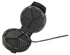 An open waffle maker with heart-shaped indentations. Produktbild-Vorschau