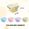 A set of small, colorful food storage containers with dimensions indicated by text overlays. The background features stylized lemon slices and leaves. Produktbild-Vorschau