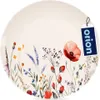 A close-up view of a round plate with a floral pattern. Anteprima dell’immagine prodotto