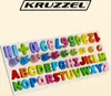 A wooden puzzle board with colorful alphabet letters and numbers. Náhled obrázku produktu