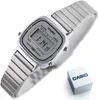 A digital Casio watch with a silver metal band is shown on a white background, with its original packaging box nearby. Podgląd zdjęcia produktu