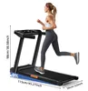 A woman is running on a treadmill indoors, with dimensions and incline percentage indicated. Produktbild-Vorschau