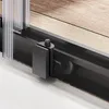 Close-up view of a shower door sliding mechanism and track. Produktbild-Vorschau