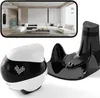 A robot companion, its charging dock, and a smartphone displaying a live feed of a living room. Produktbild-Vorschau
