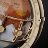 A close-up shot of a wooden globe model, focusing on the details of its construction and the map on its surface. Náhľad obrázku produktu