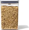 A clear, well-lit studio shot of a food storage container filled with oats, against a white background. Produktbild-Vorschau