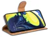 A smartphone in a brown flip case, displayed at an angle on a white background. Anteprima dell’immagine prodotto