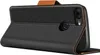 A black flip case for a phone is shown standing up, with the phone inside. Náhľad obrázku produktu
