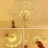 A collage of images showing a starburst LED light string, with one image showing it in a vase, another showing it laid out, and a third showing a hand holding it. Produktbild-Vorschau