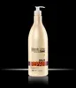 A bottle of hair balm with a pump dispenser against a black background. Náhled obrázku produktu