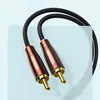 A close-up shot of two UGREEN RCA to 3.5mm audio cables. Náhled obrázku produktu