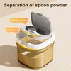 A close-up of a powder dispenser with its lid open, showing a spoon inside. Produktbild-Vorschau